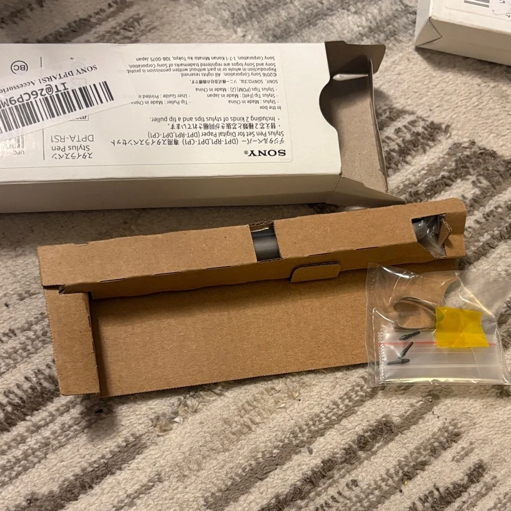 Sony White, Brown and Yellow Accessory Kit with Small Parts